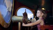 A child steering the submarine